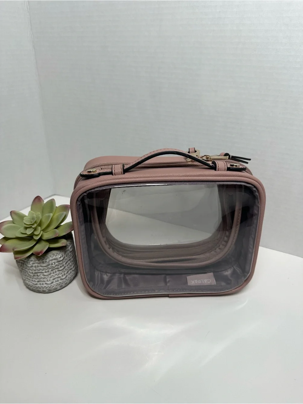 Calpak clear front
